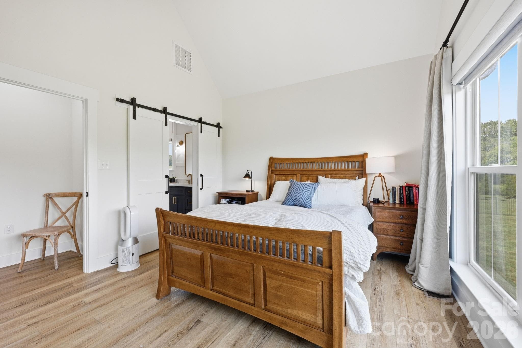 Exposed Beam Ceiling in Primary Bedroom - 215 Cal Kennedy Road, Cleveland