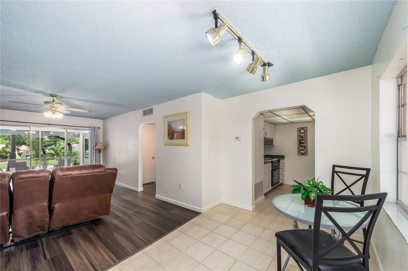Bright and open dining and living space - 209 CORDOVA GRN #209, SEMINOLE
