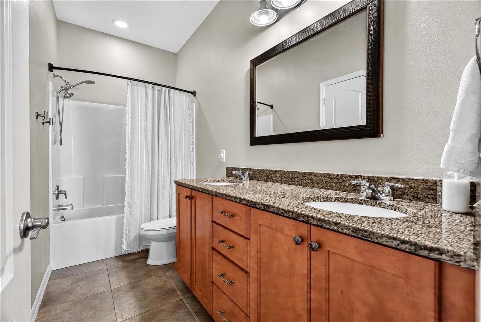 SECONDARY BATH NEXT TO THE POOL - 19749 QUINELLA ST, ORLANDO