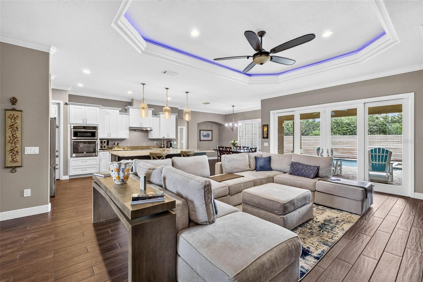 Living room with view of kitchen - 4760 LAGO VISTA CIR, LAND O LAKES