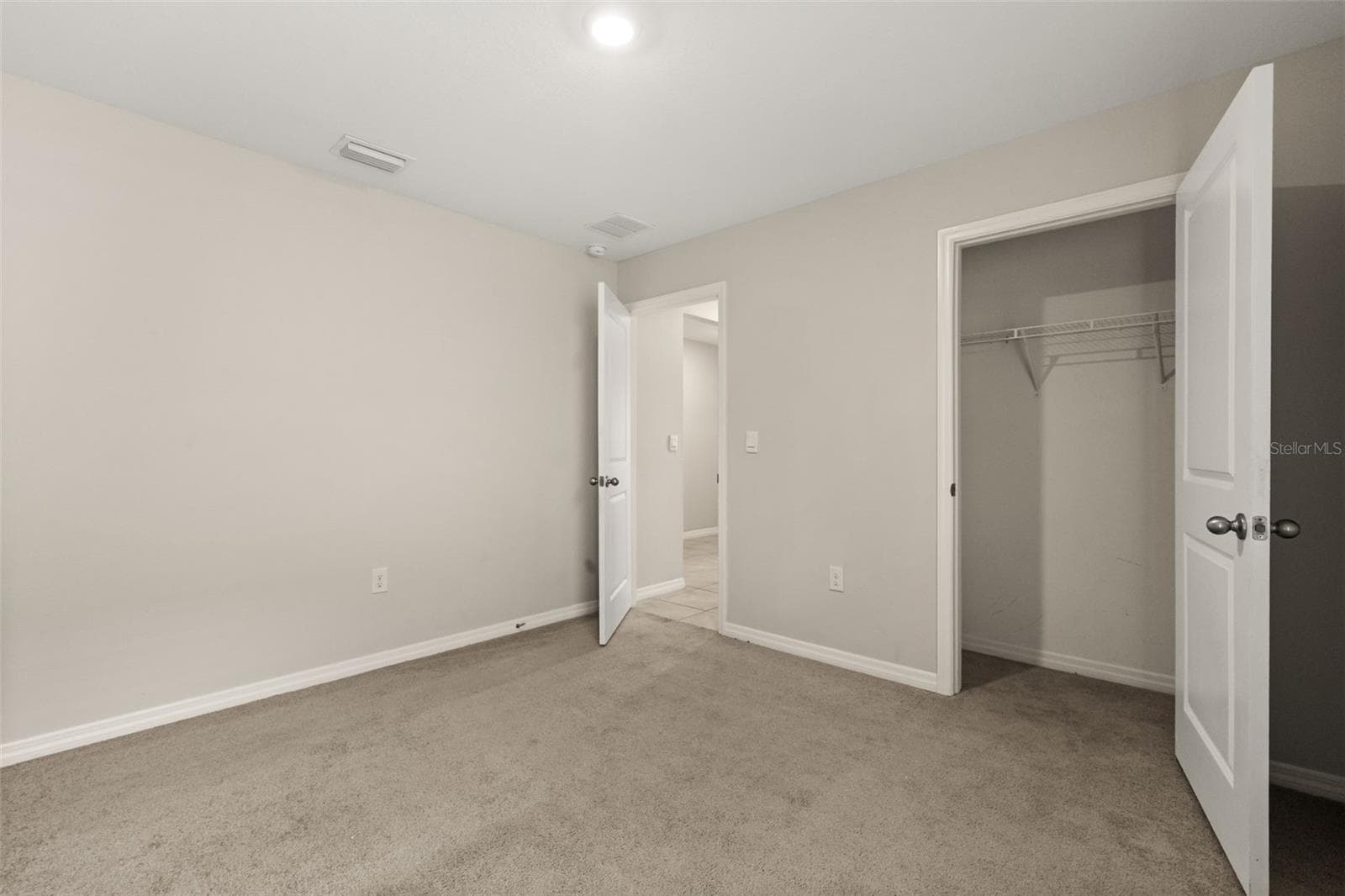 Bedroom with closet - 8780 SW 49TH CIR, OCALA