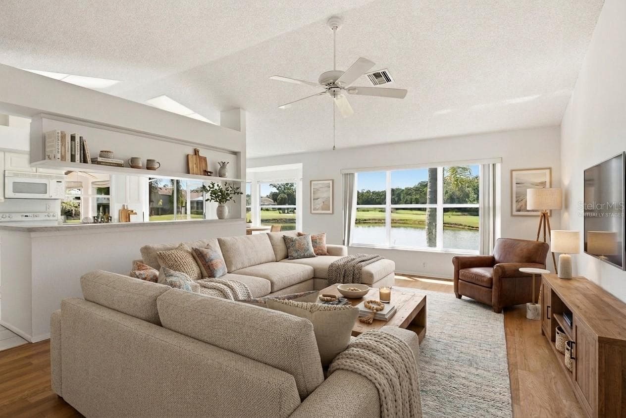 Virtually Staged Family Room - 6639 SUN POINT CT, NEW PORT RICHEY