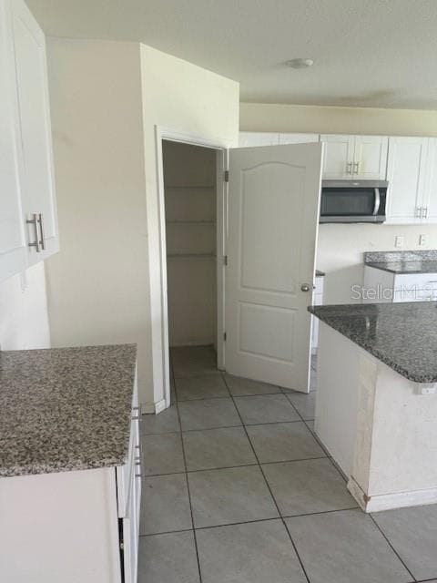 Your Kitchen with lots of cabinets and counter top space,=, - 1550 OAK RESERVE DR, KISSIMMEE