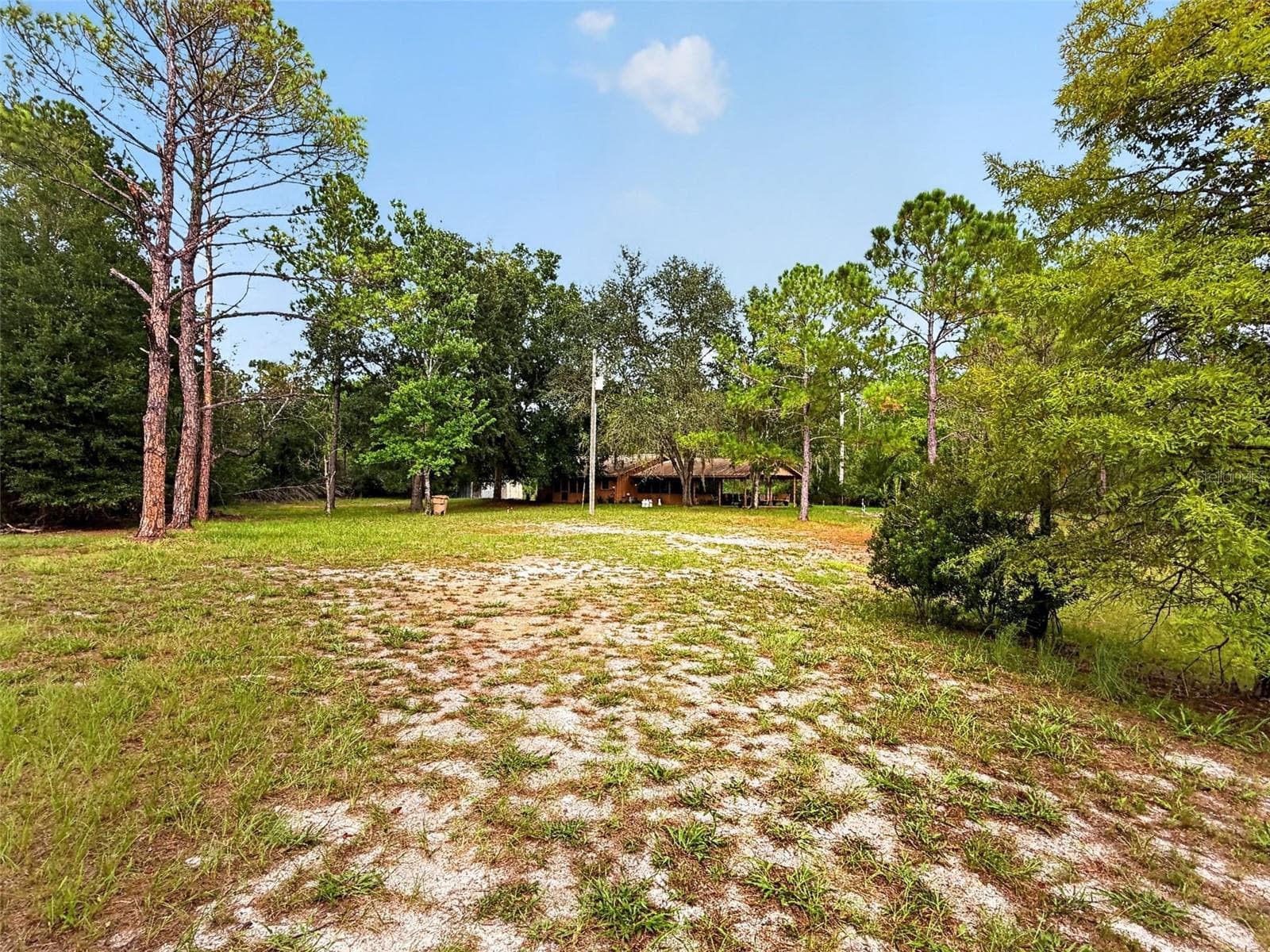 Long view of home from just inside the gate - 24939 OLD DEER RD, PAISLEY