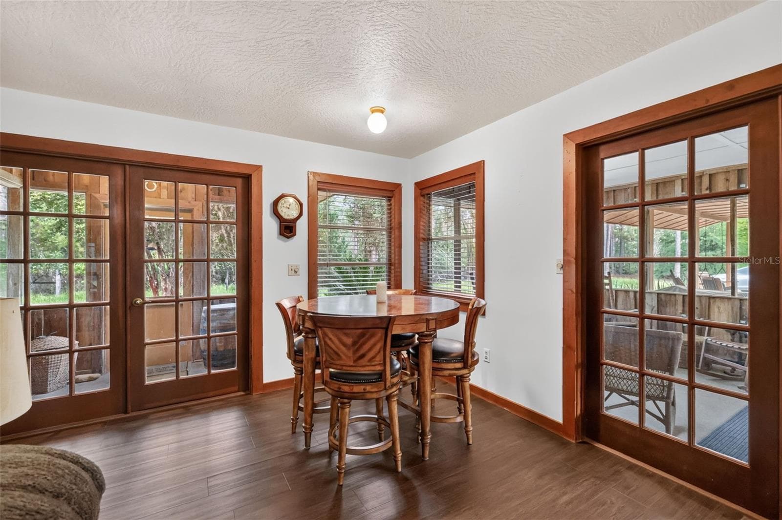 Dinette area surrounded by windows to nature - 24939 OLD DEER RD, PAISLEY