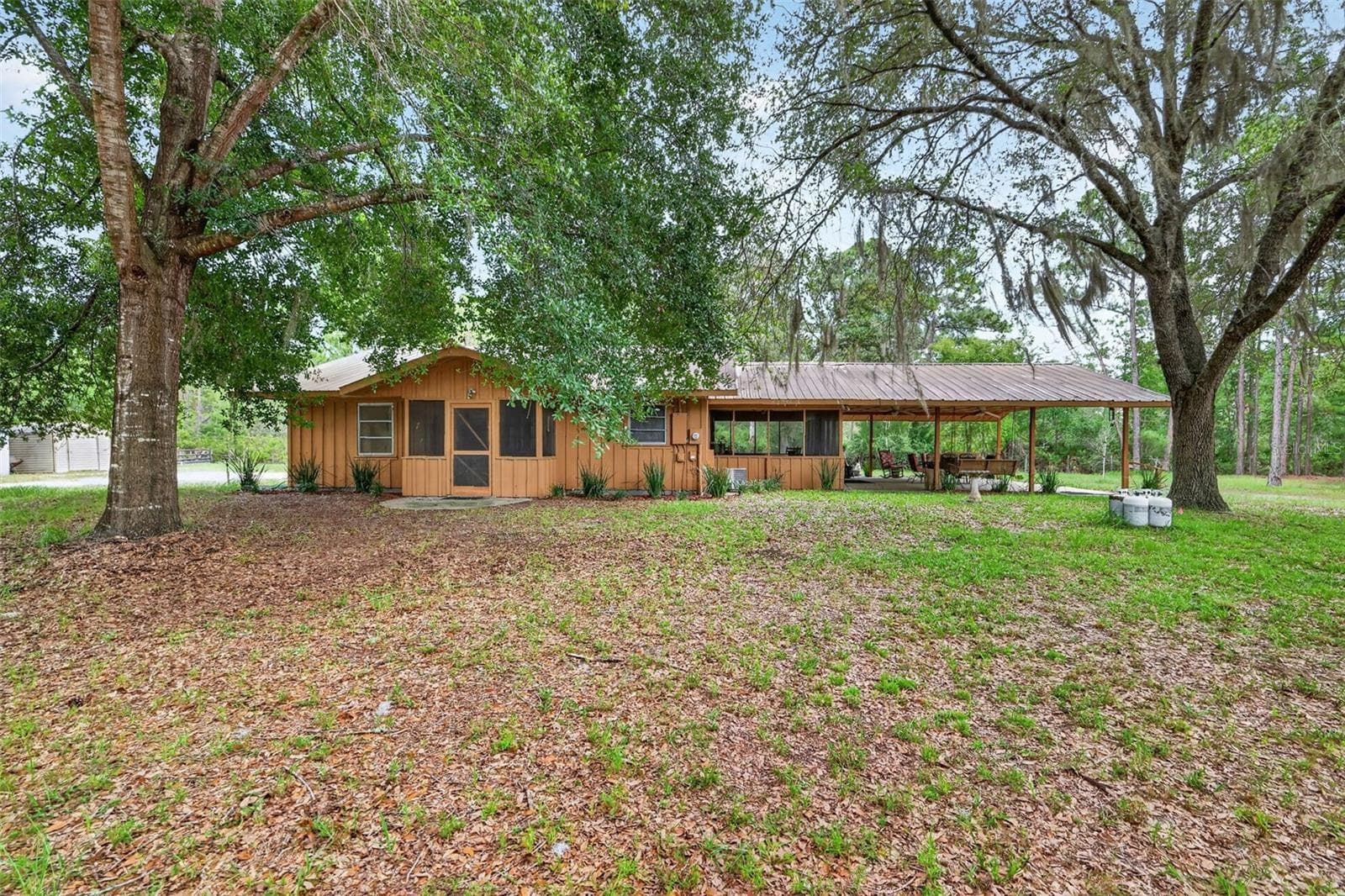 Full on side view from yard - 24939 OLD DEER RD, PAISLEY