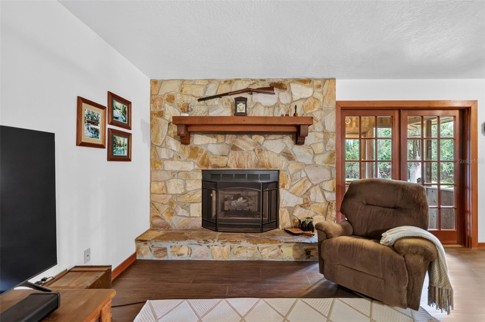 Full on view of gas fireplace - 24939 OLD DEER RD, PAISLEY