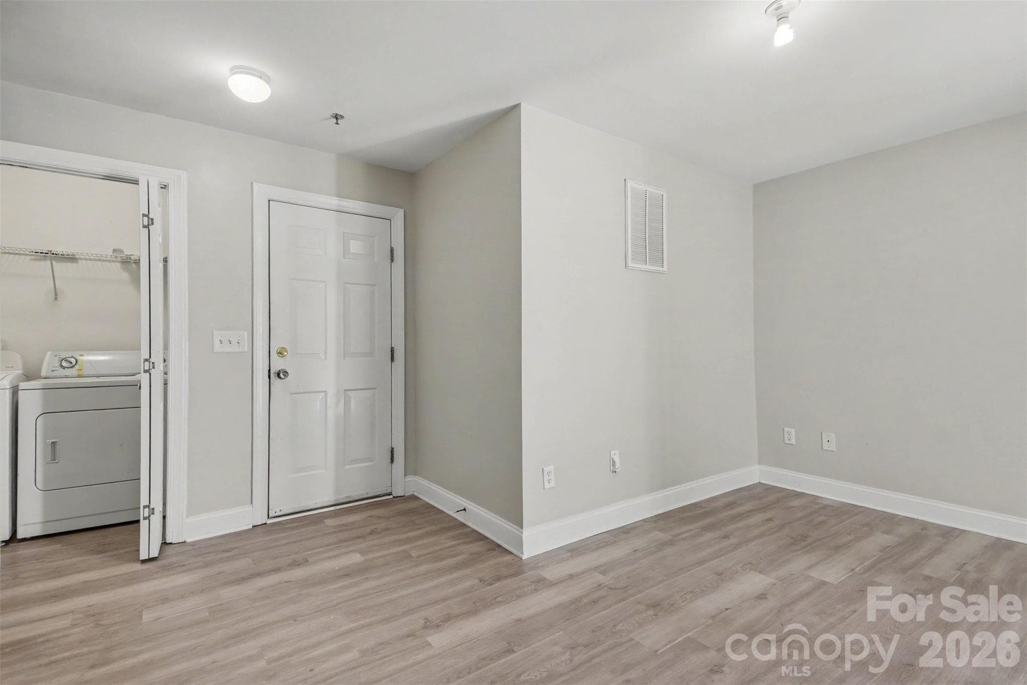 Lower Level Laundry Room and Garage Entrance - 6858 Park Place Drive, Charlotte
