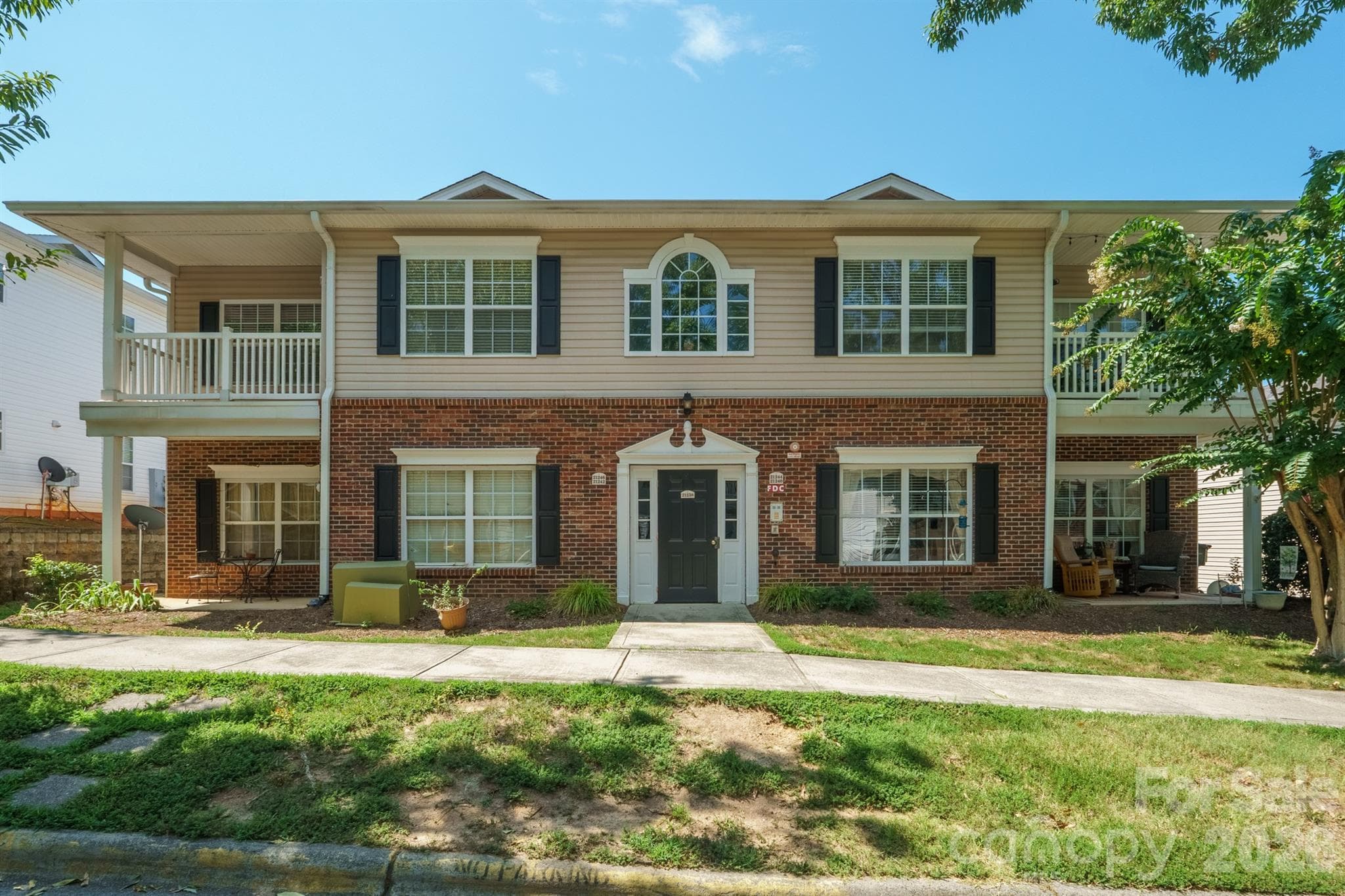 Brick and vinyl secured building - 21246 Hickory Street, Cornelius