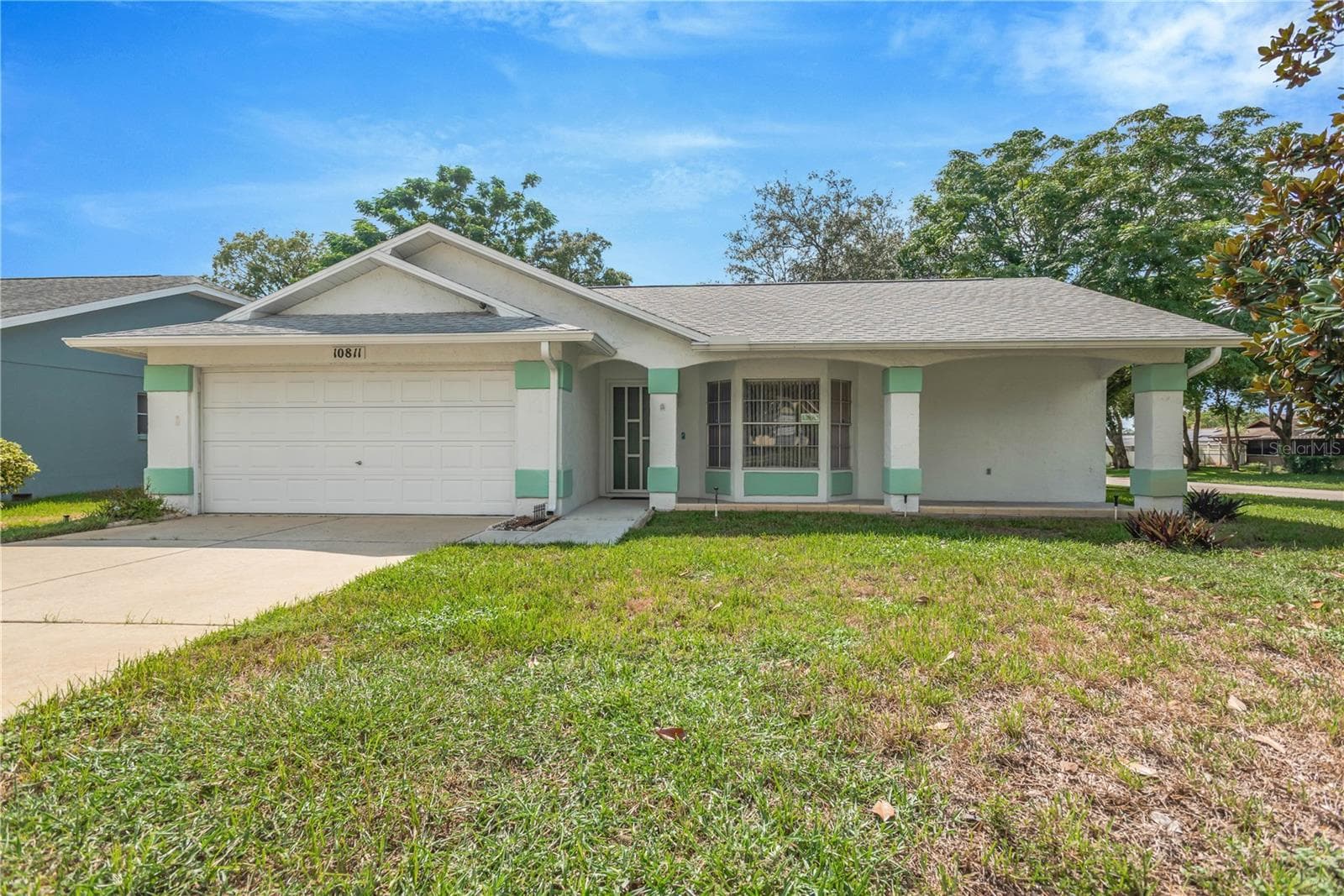 Single Family Residence at 10811 PEPPERTREE LN, PORT RICHEY, photo 2 of 15