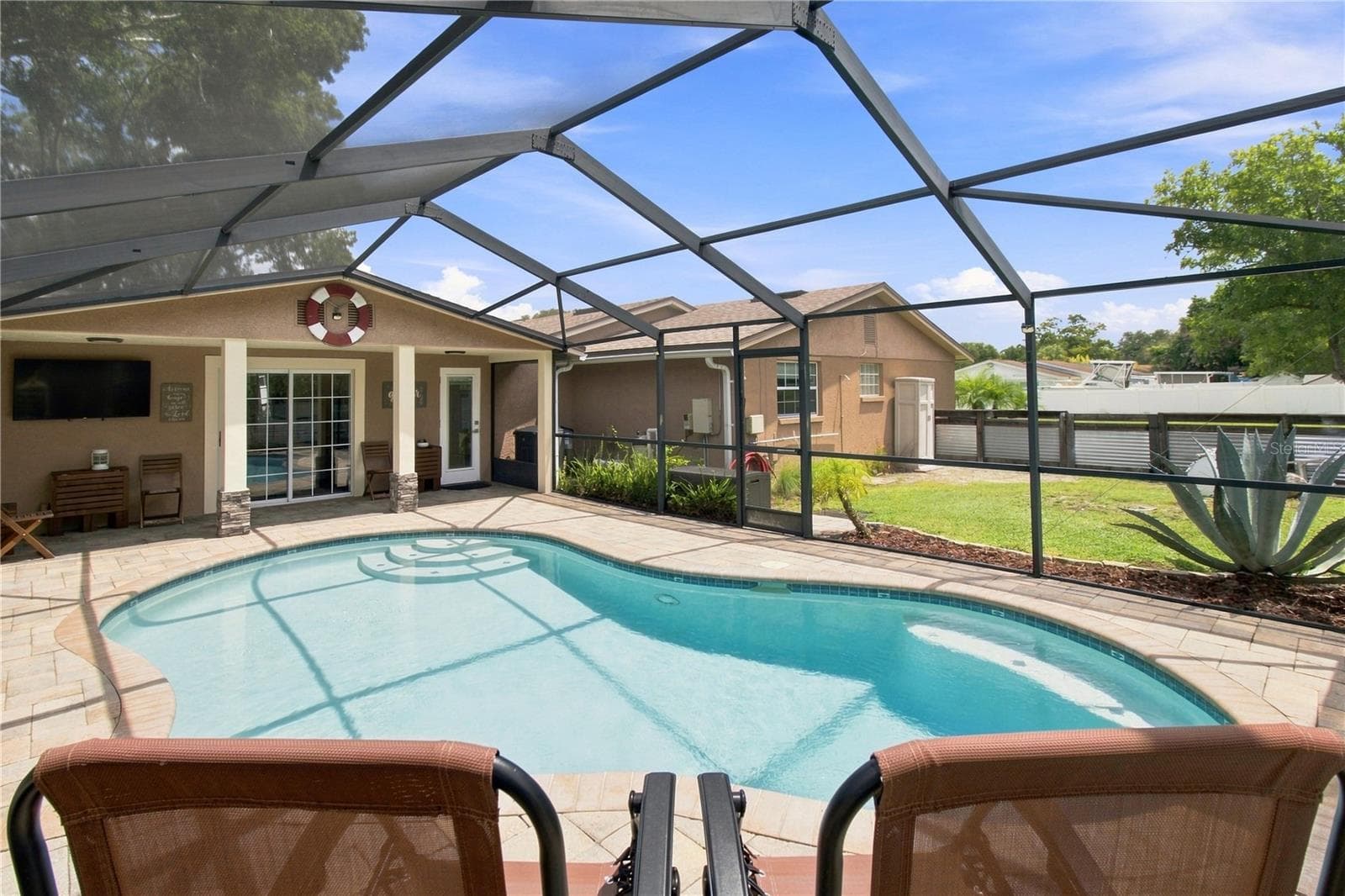Sparkling pool with water cascade feature - 9020 AUBURN WAY, TAMPA