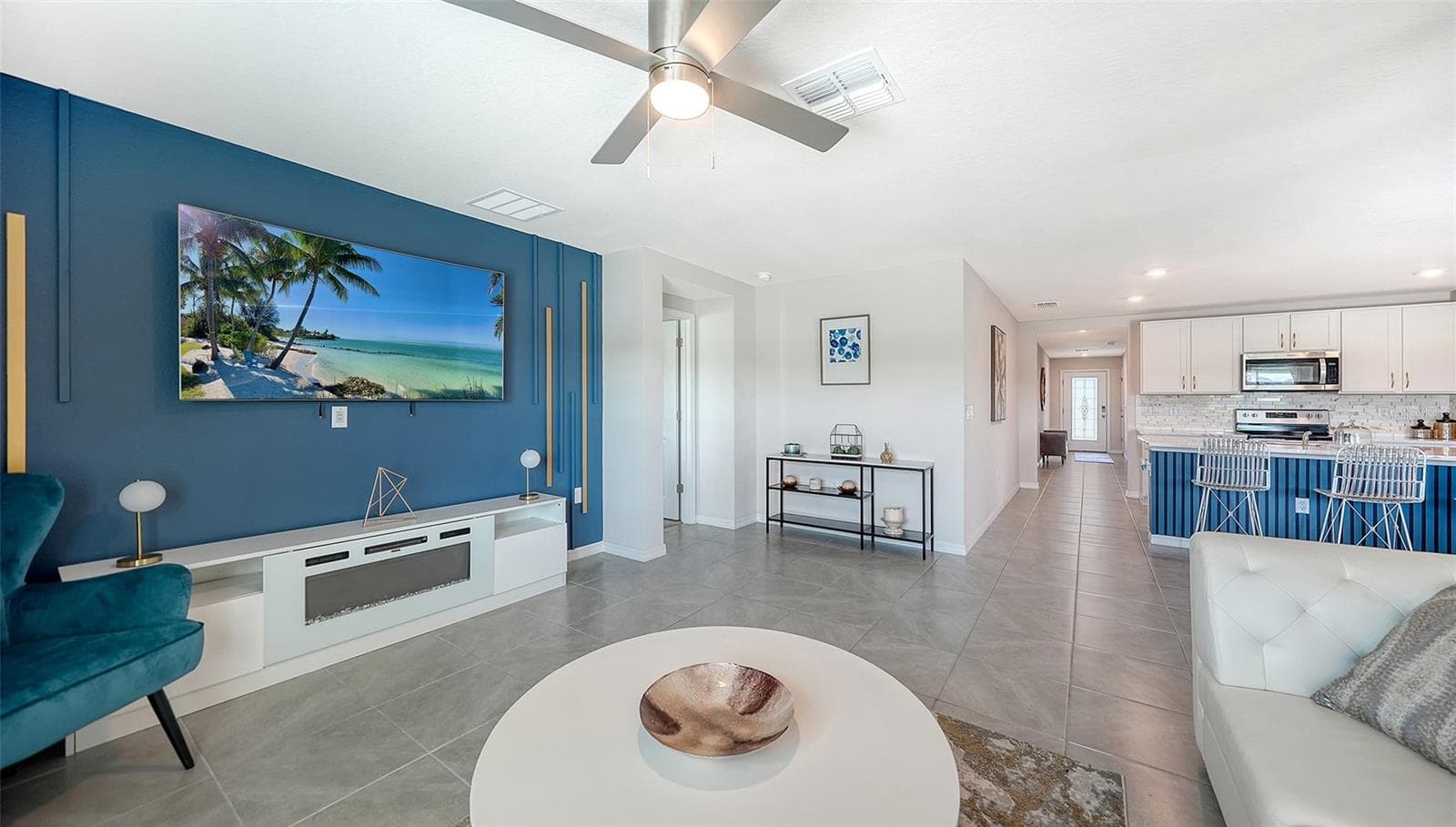Upgraded designer wall in the great room. - 10402 CHARLOTTE DR, PARRISH