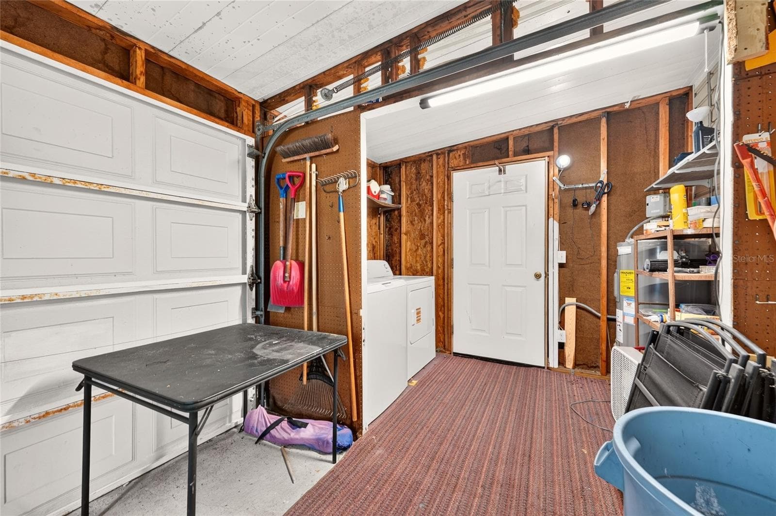 Golf Cart Garage looking into Laundry - 1207 PALMETTO DR, THE VILLAGES