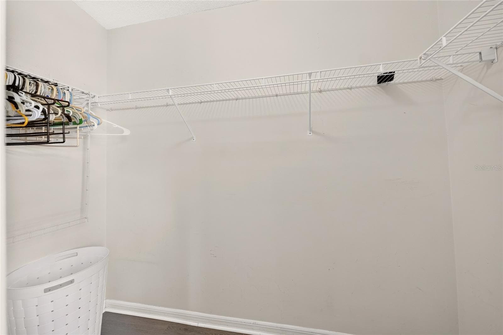 Walk-in Closet in Primary - 1207 PALMETTO DR, THE VILLAGES