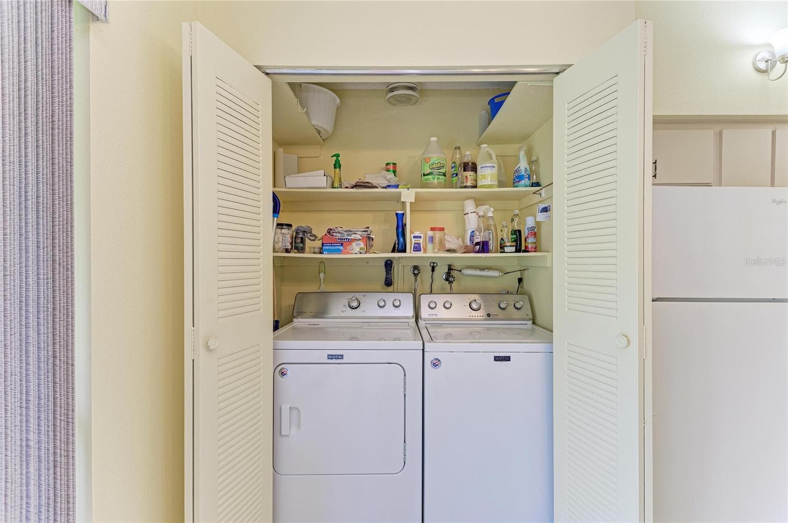 Laundry closet in the kitchen - 3403 36TH ST W #109, BRADENTON