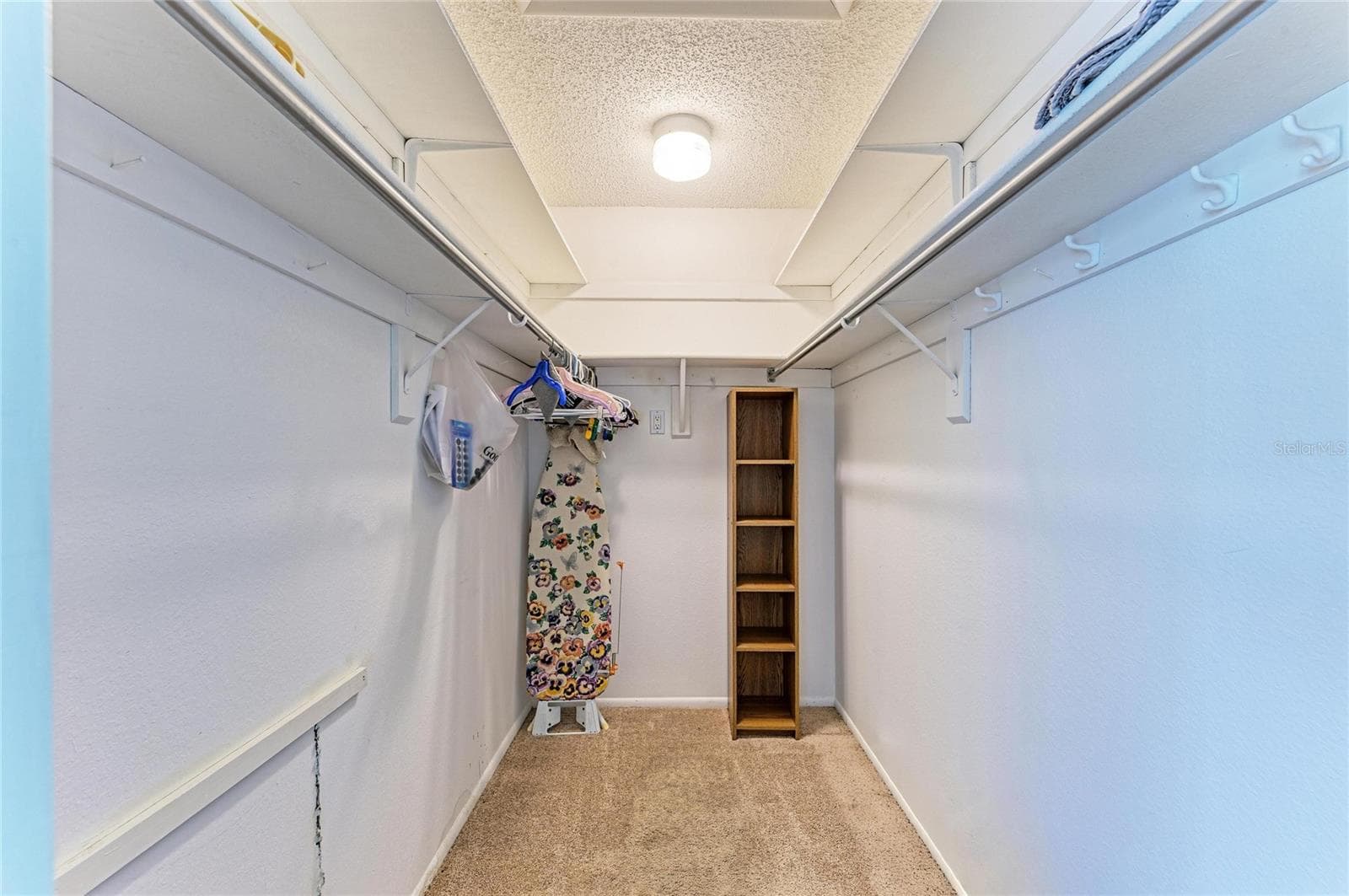 Primary bedroom walk-in closet - 3403 36TH ST W #109, BRADENTON