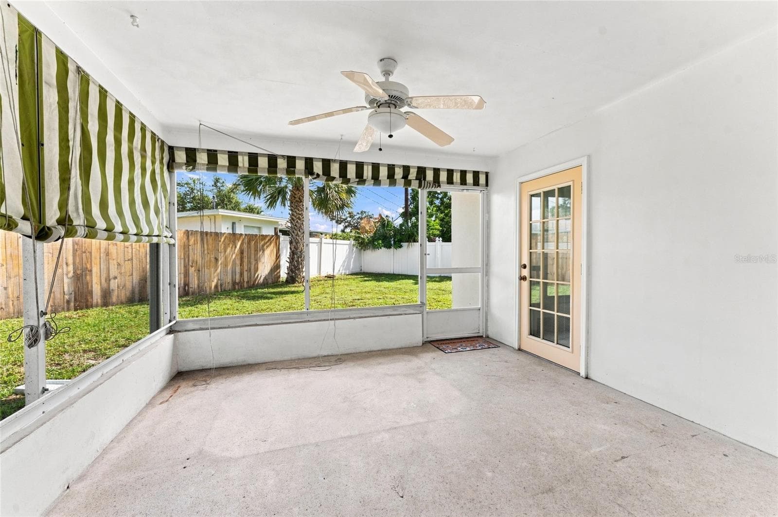 screened in lanai off of primary bedroom and living room - 1773 LONDON LN, CLEARWATER