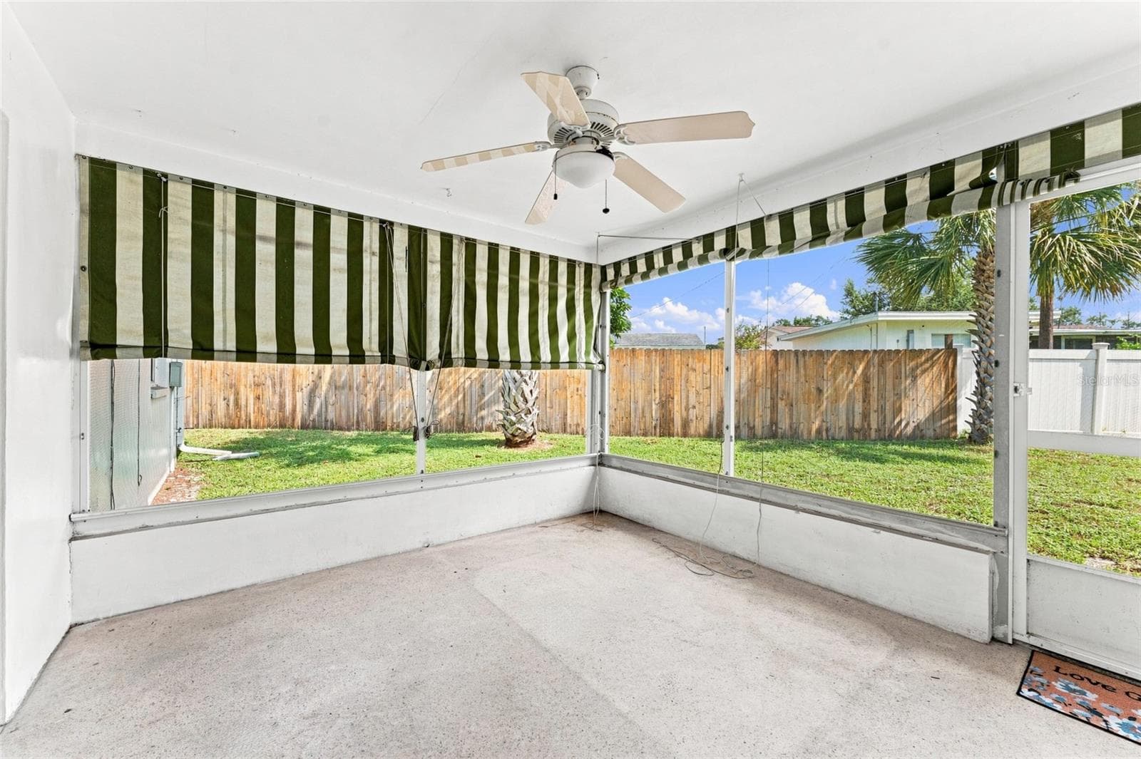 screened in lanai off of primary bedroom and living room - 1773 LONDON LN, CLEARWATER
