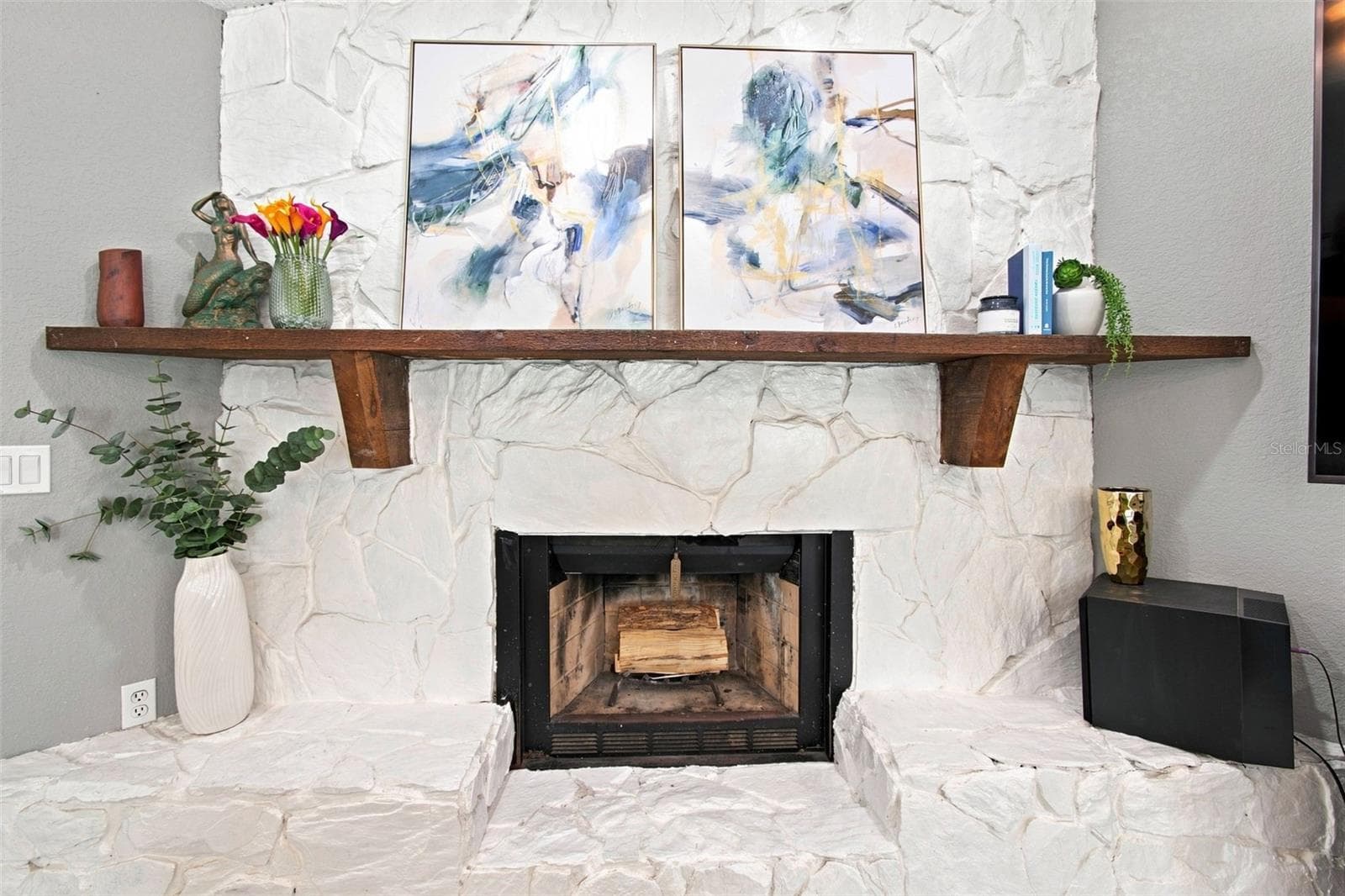 Stone Wood Burning Fireplace 2nd Floor - 201 LAGOON DR, PALM HARBOR