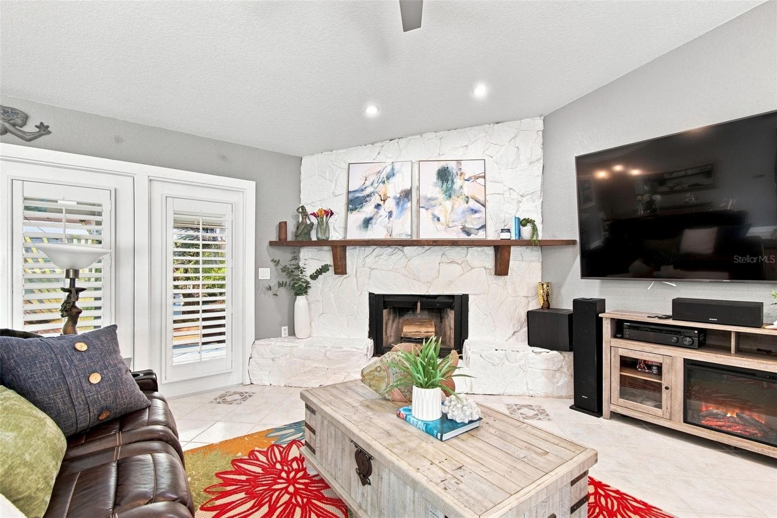 Living Area 2nd Floor with Balcony Access - 201 LAGOON DR, PALM HARBOR