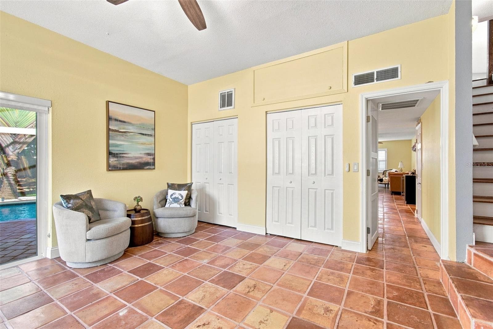 Bedroom 3 or Office downstairs with Access to pool - 201 LAGOON DR, PALM HARBOR