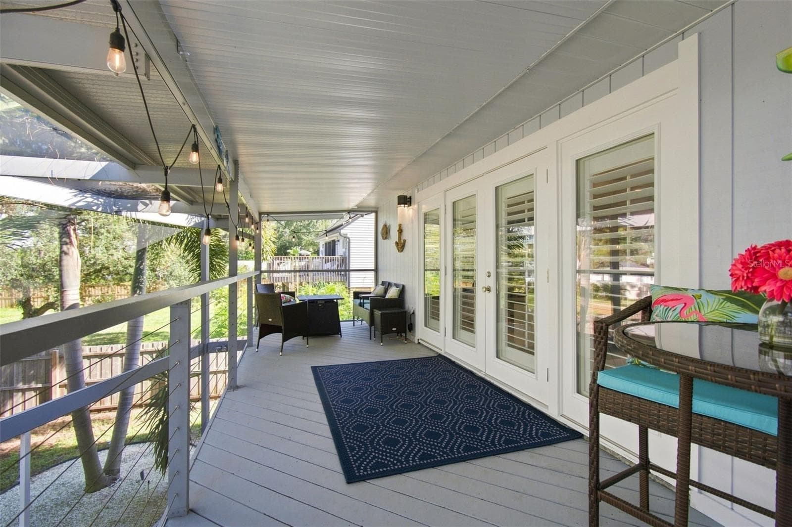 Covered Balcony upstairs outside of main living - 201 LAGOON DR, PALM HARBOR