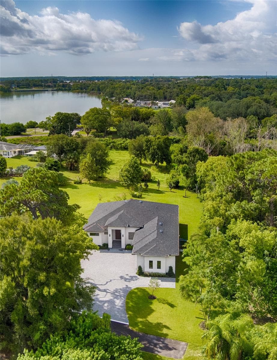 Aerial view of the property. Peaceful. Private. Surrounded by nature. - 1336 HAYS RD, TARPON SPRINGS