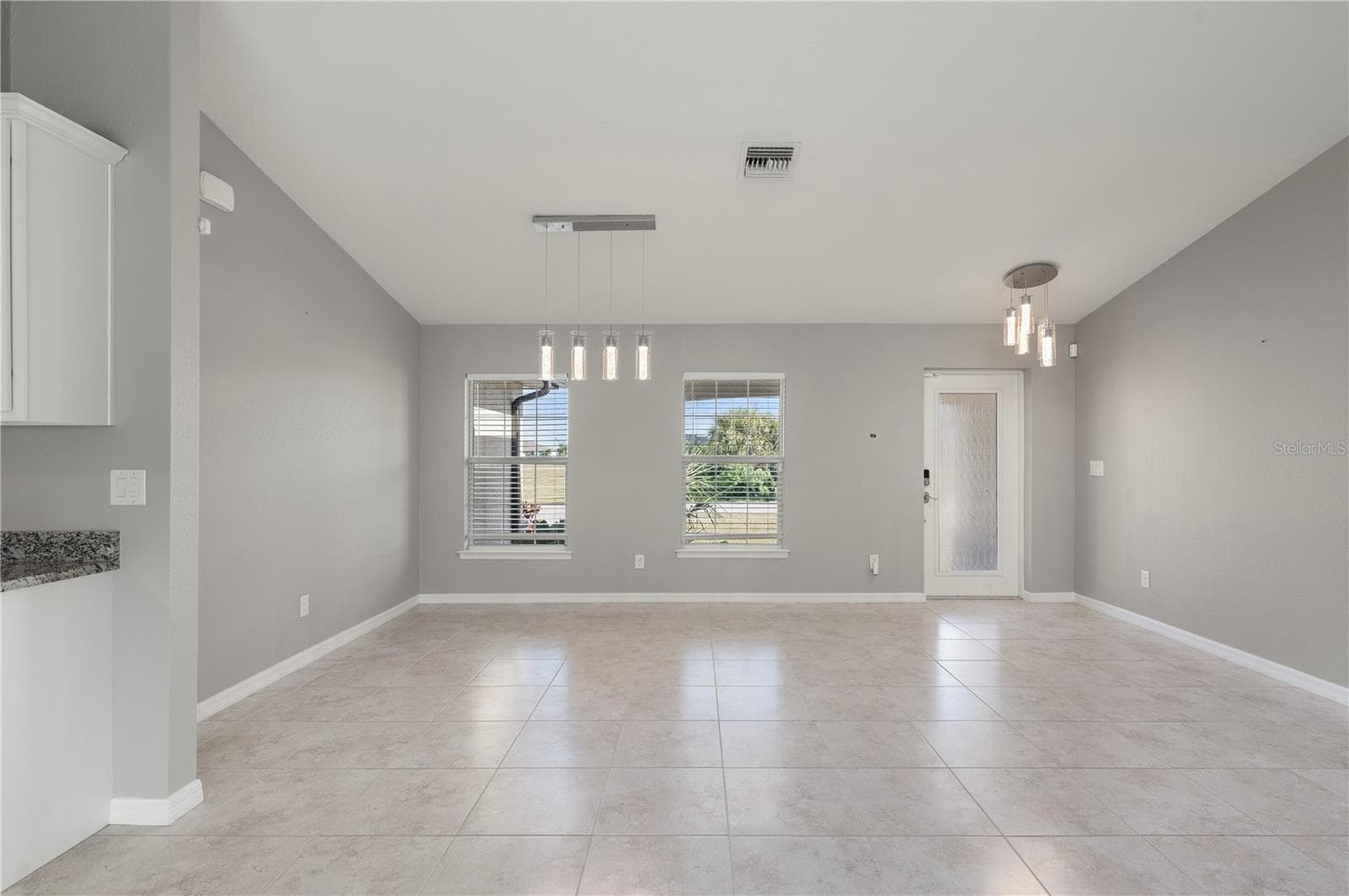 Spacious Living Room with Neutral Tile Flooring - 4302 NW 32ND ST, CAPE CORAL