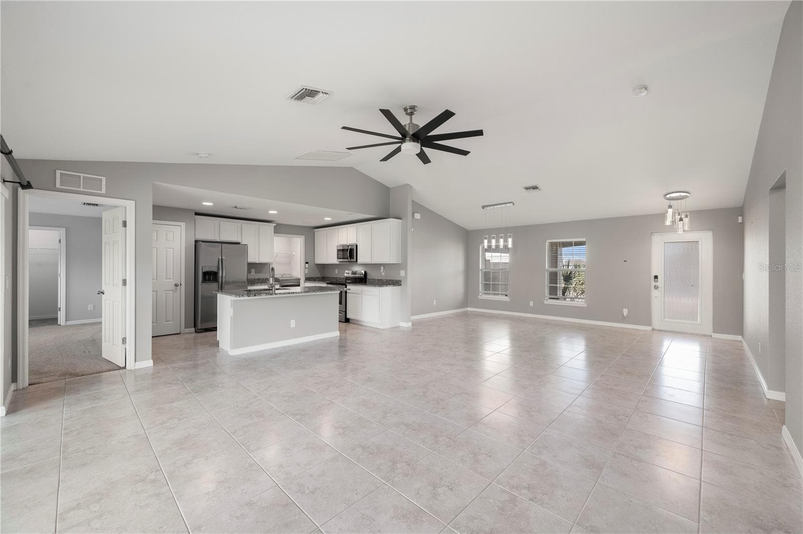 View of Kitchen from Living Room - 4302 NW 32ND ST, CAPE CORAL