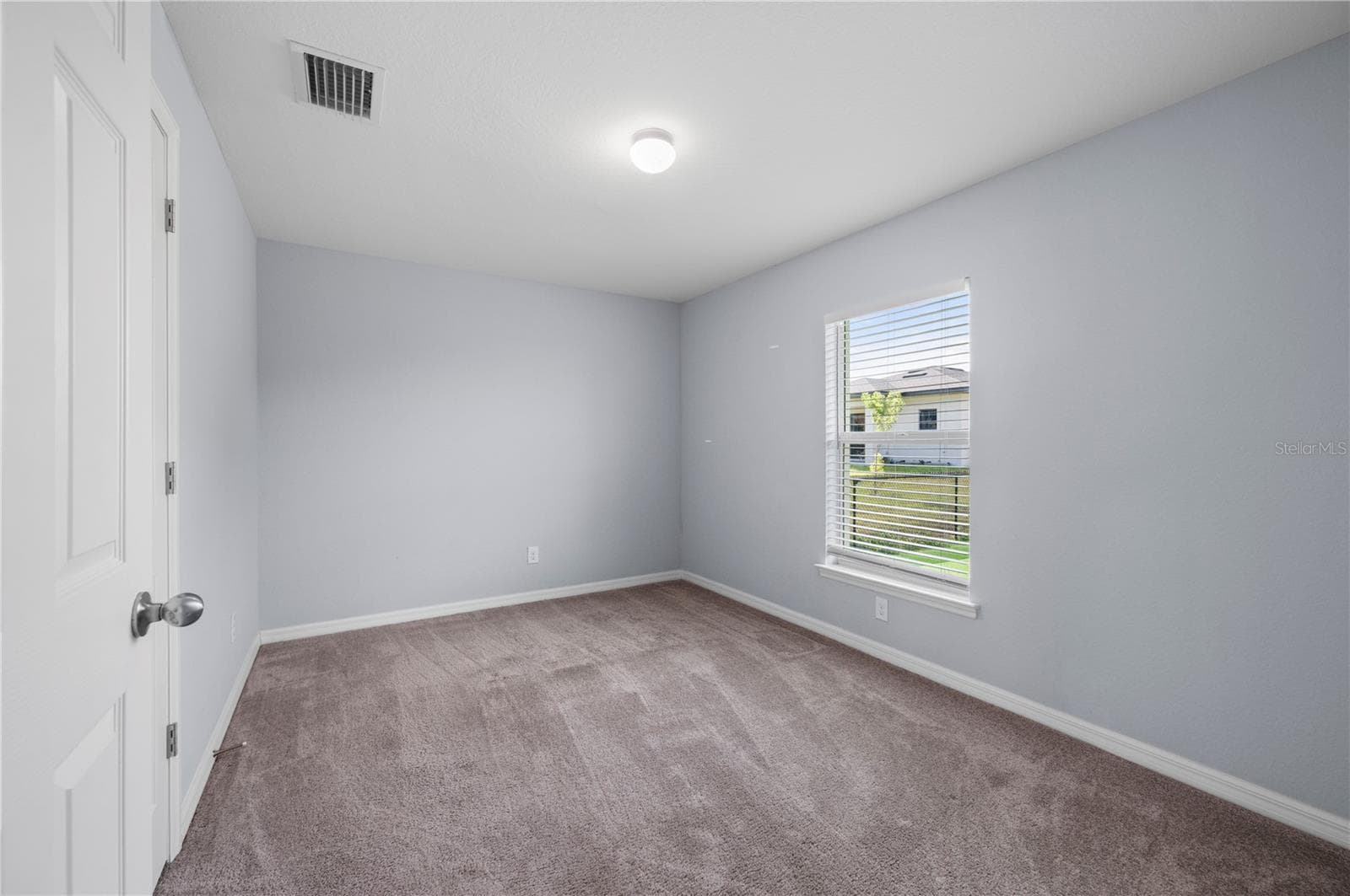 Guest Bedroom with Neutral Carpet - 4302 NW 32ND ST, CAPE CORAL