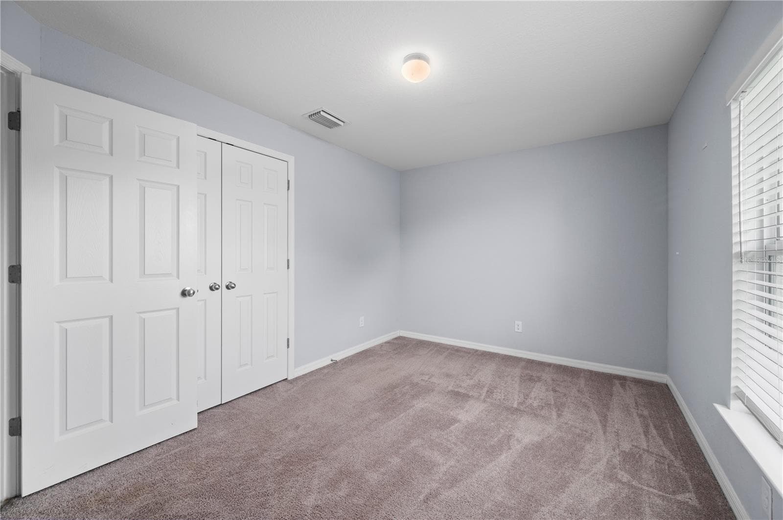Guest Bedroom with Neutral Carpet - 4302 NW 32ND ST, CAPE CORAL