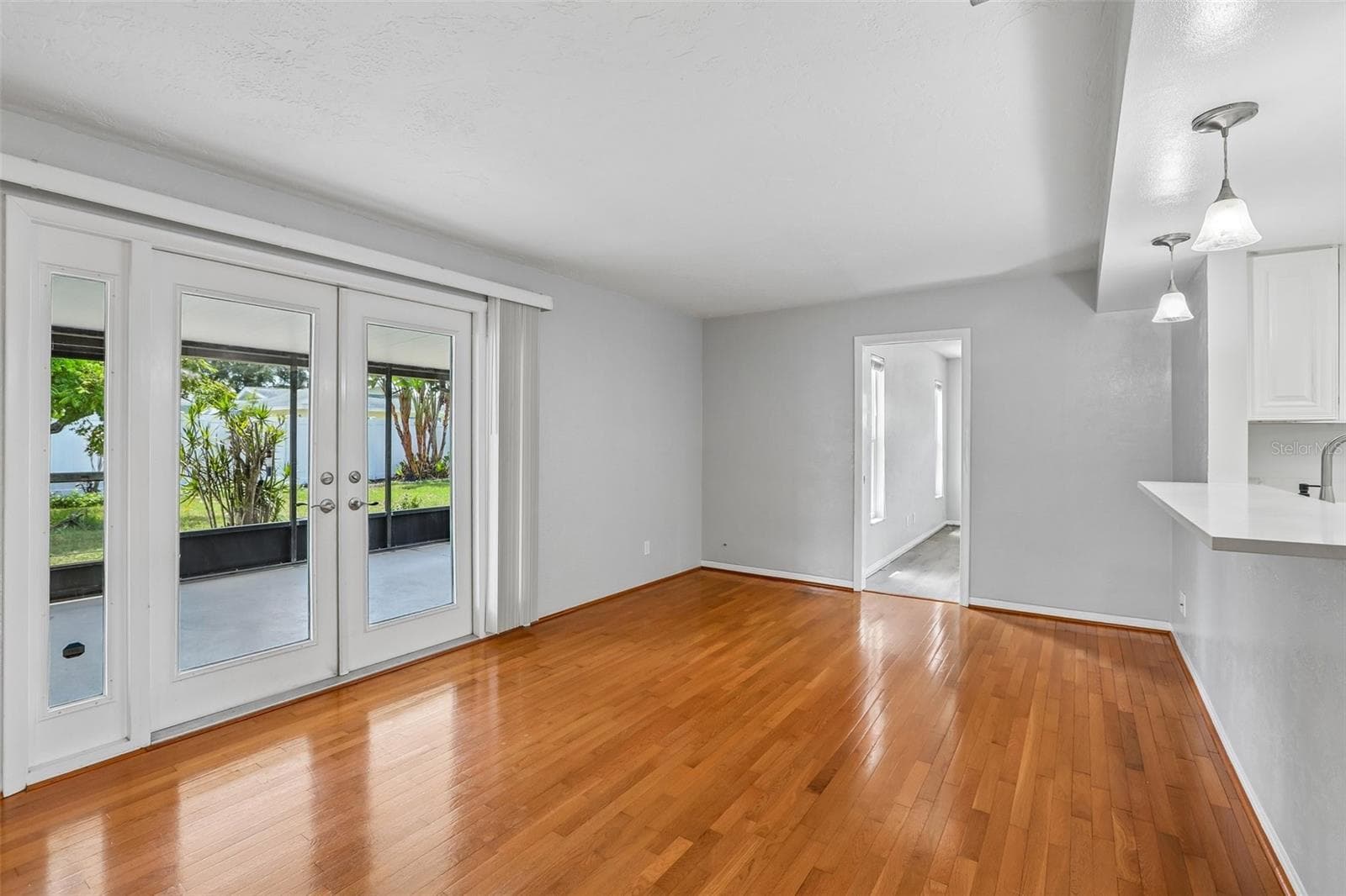 Family Room Overlooking Enclosed Porch - 13178 88TH AVE N, SEMINOLE