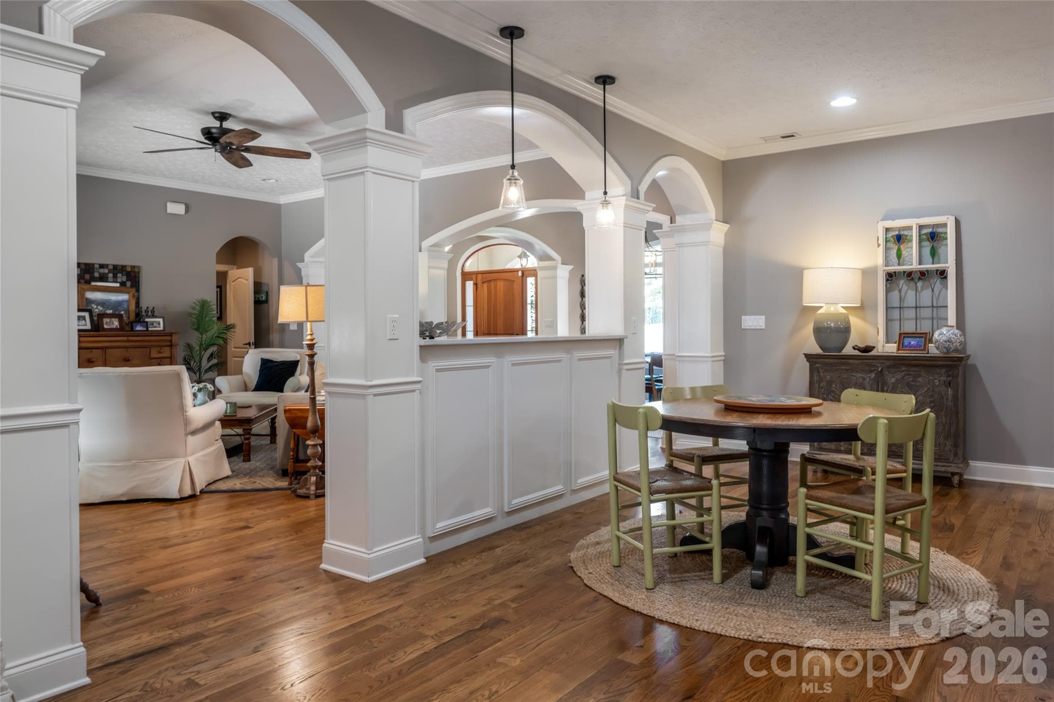 Breakfast area with kitchen to the right, living and dining room through the arches... - 170 Cape Martin Circle, Hendersonville