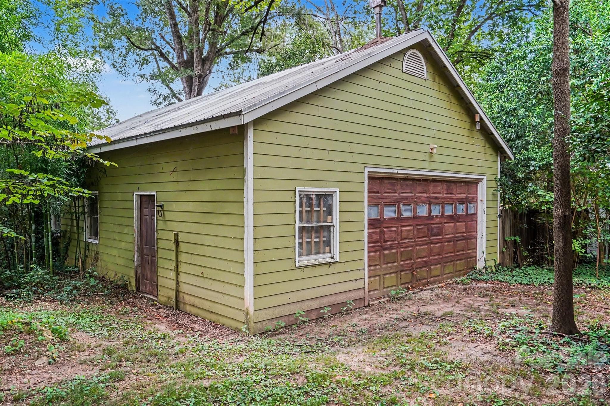 Don't miss the Detached Garage to right of home! - 810 E Franklin Street, Monroe