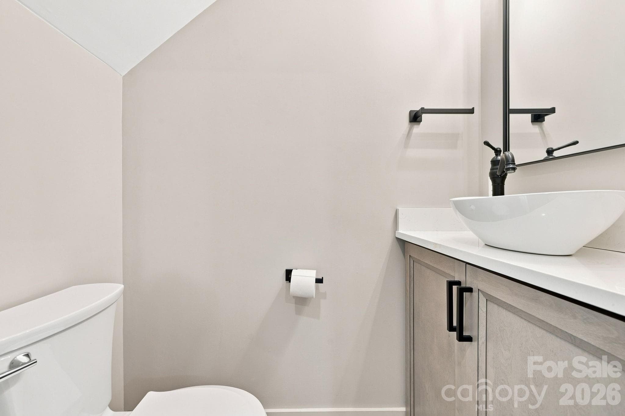 main level half bath - 128 Chepstow Place, Black Mountain