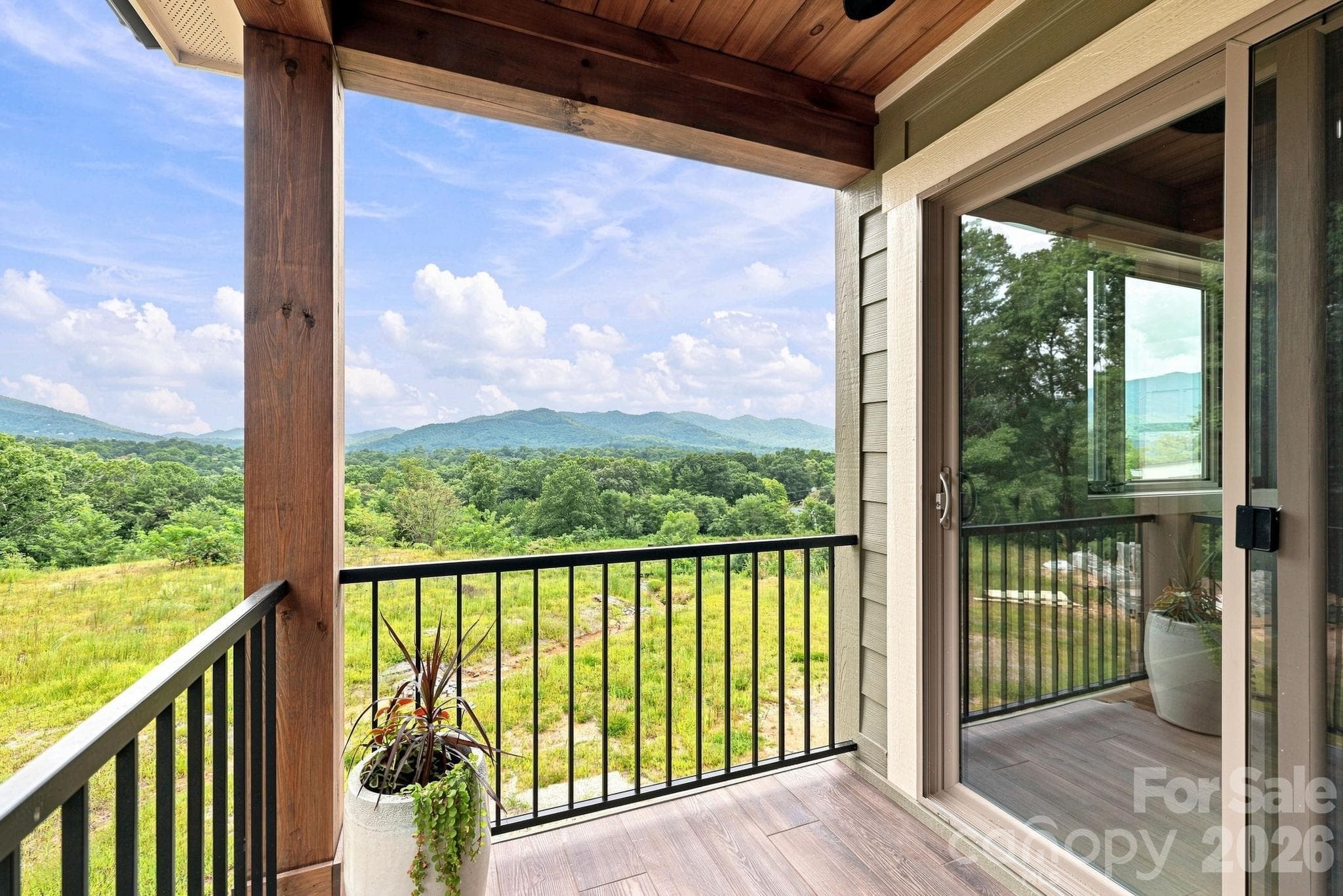Upper level Primary Bedroom Deck - 128 Chepstow Place, Black Mountain