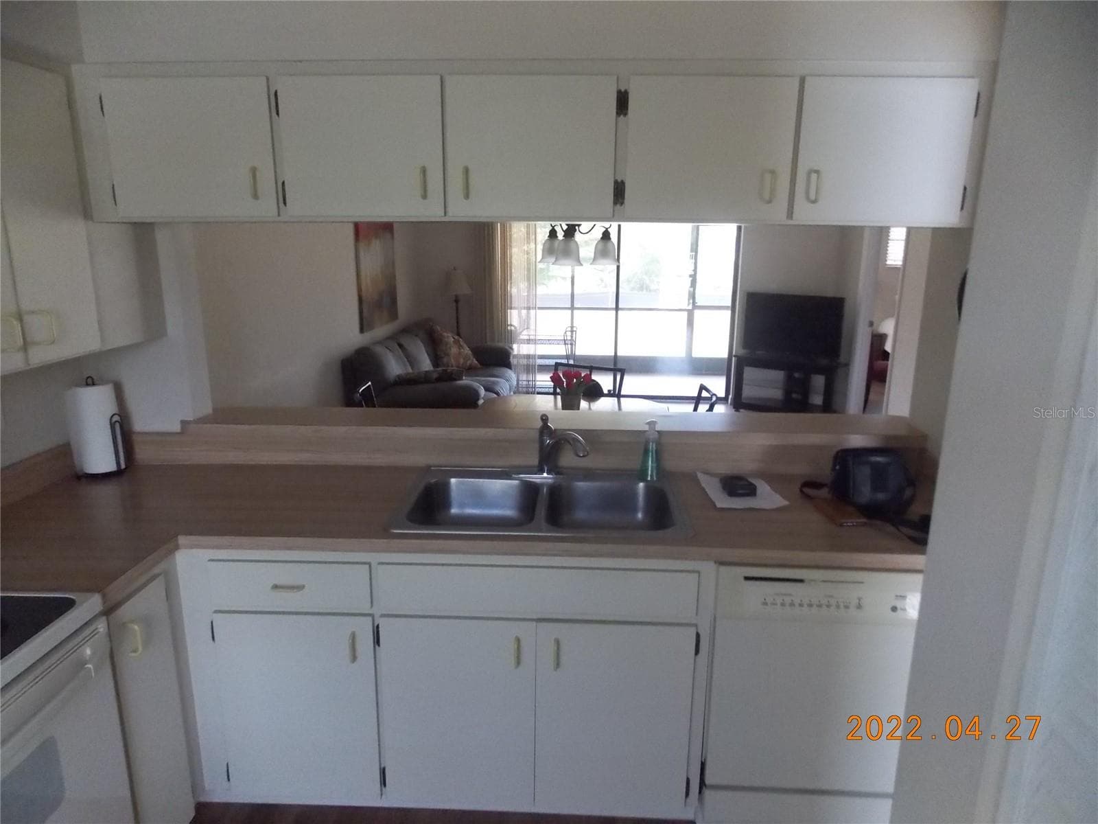 Convenient pass through to dining area - 26267 NORTHERN CROSS RD #6C, PUNTA GORDA