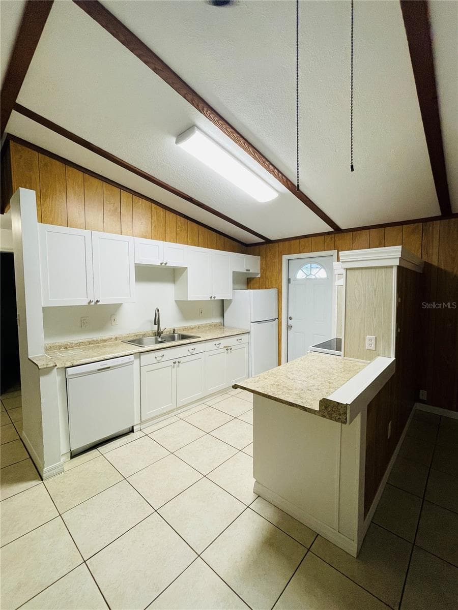View to kitchen from Living area. - 1335 S MARTIN LUTHER KING JR AVE, CLEARWATER
