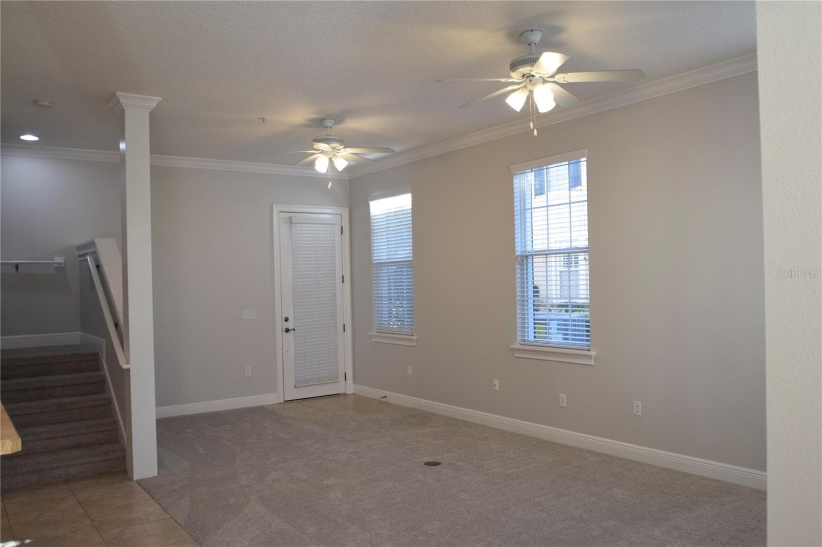 View of entrance from Lake Baldwin Street and stairs up to three spacious bedrooms and 2 full bathroom. - 1352 LAKE BALDWIN LN #A, ORLANDO