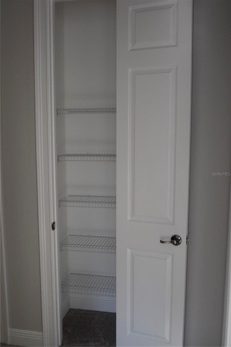 Linen closet in upstaris hallway. - 1352 LAKE BALDWIN LN #A, ORLANDO