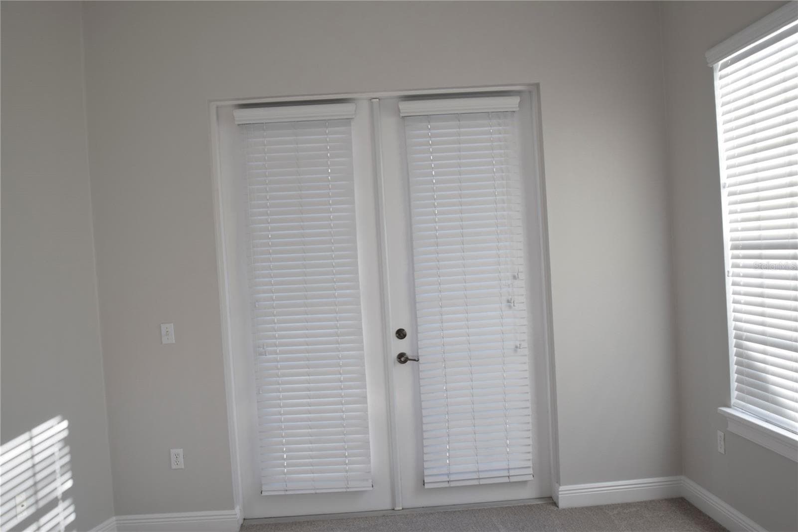 French door access to balcony overlooking Lake Baldwin Street. - 1352 LAKE BALDWIN LN #A, ORLANDO
