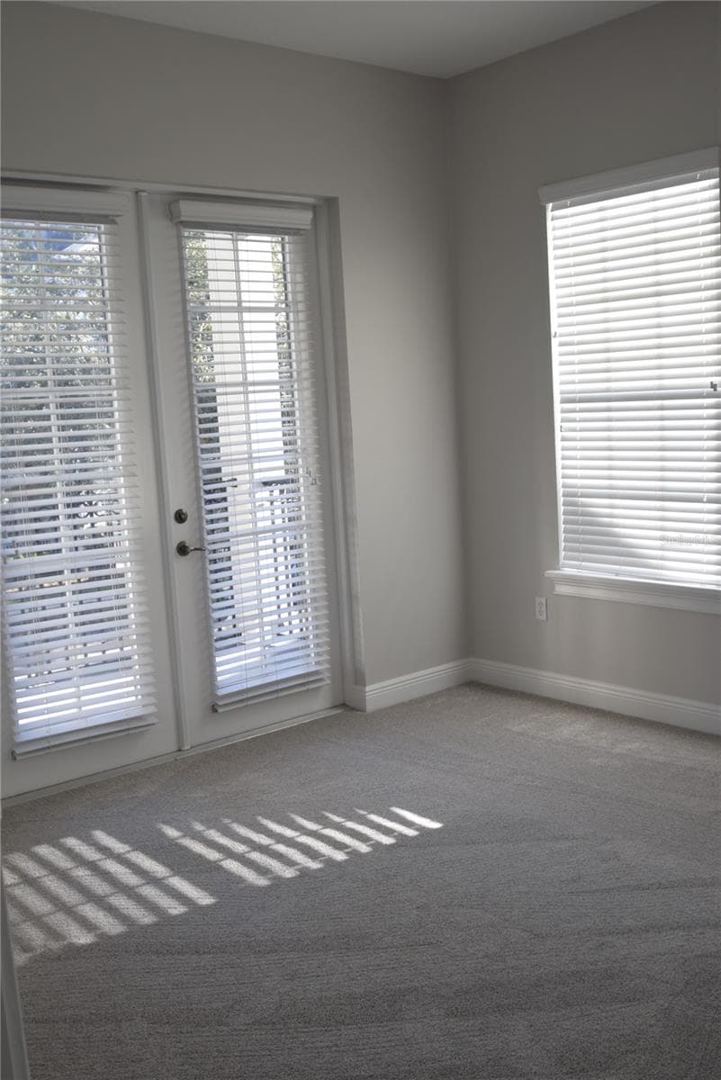 Balcony access thru French doors, bedroom #3. - 1352 LAKE BALDWIN LN #A, ORLANDO