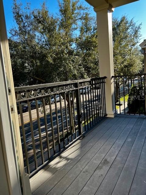 Balcony overlooking treelined Lake Baldwin Lane, access from both bedrooms 2&3. - 1352 LAKE BALDWIN LN #A, ORLANDO
