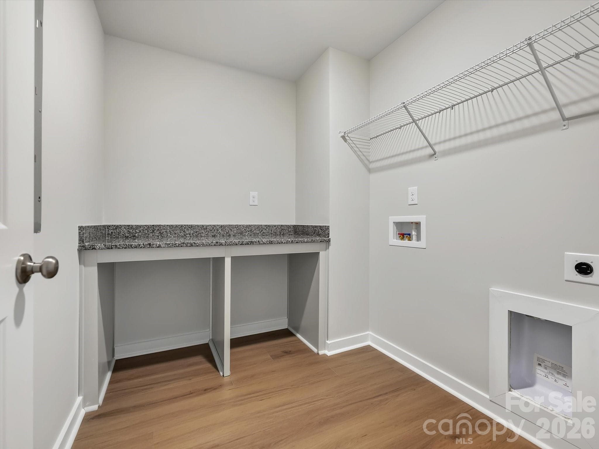 laundry room features a folding table - 276 Alluvium Lane, Waxhaw
