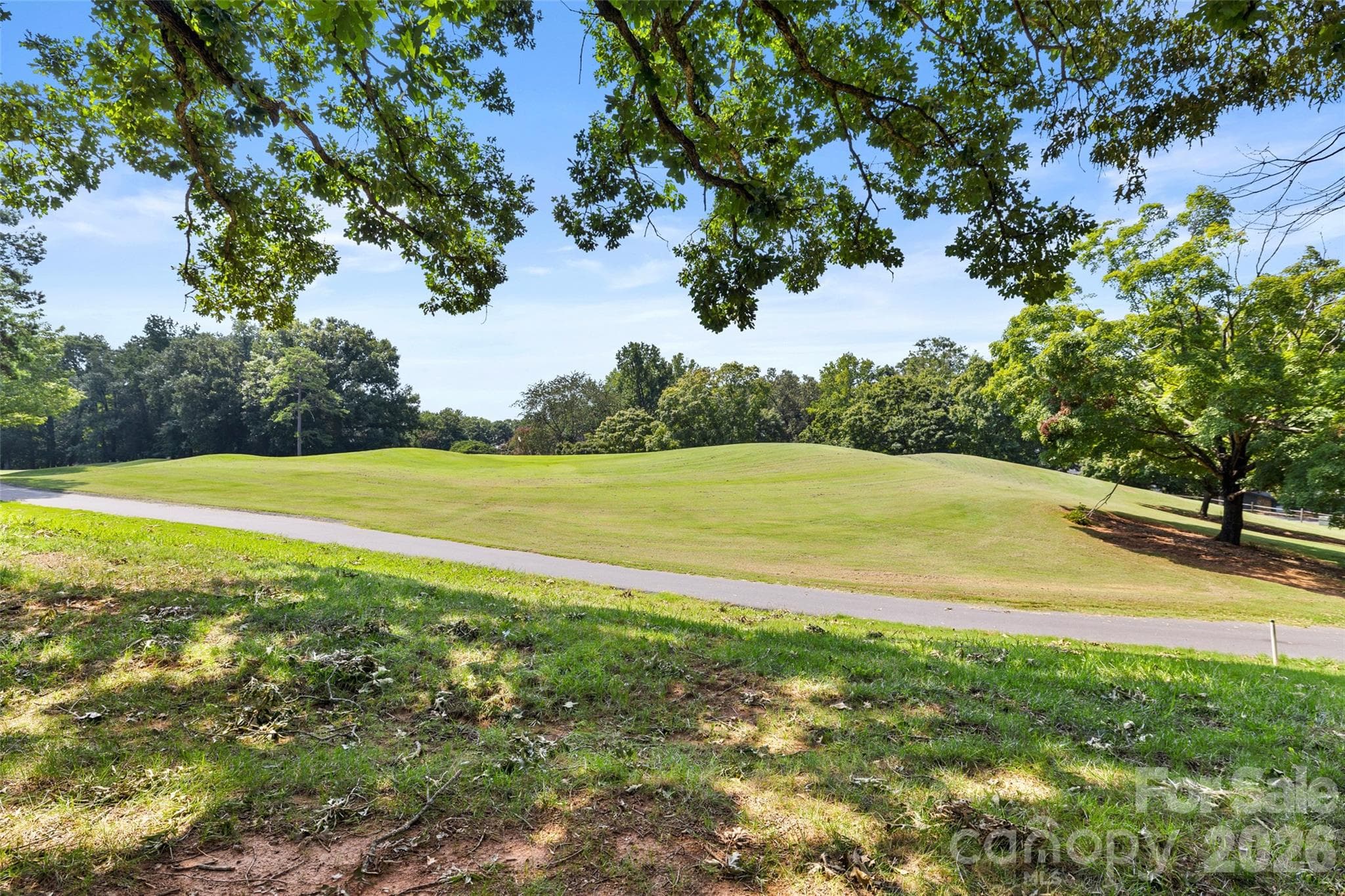 View of Raintree Golf course from covered porch - 7912 Greenside Court, Charlotte