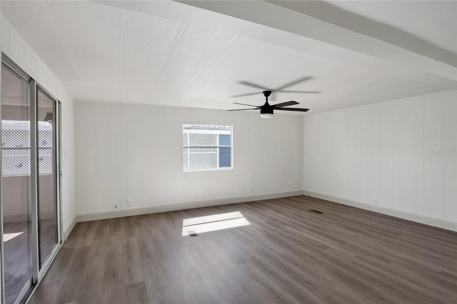 Living Room, with sliding door to Florida Room - 2055 S FLORAL AVE #55, BARTOW