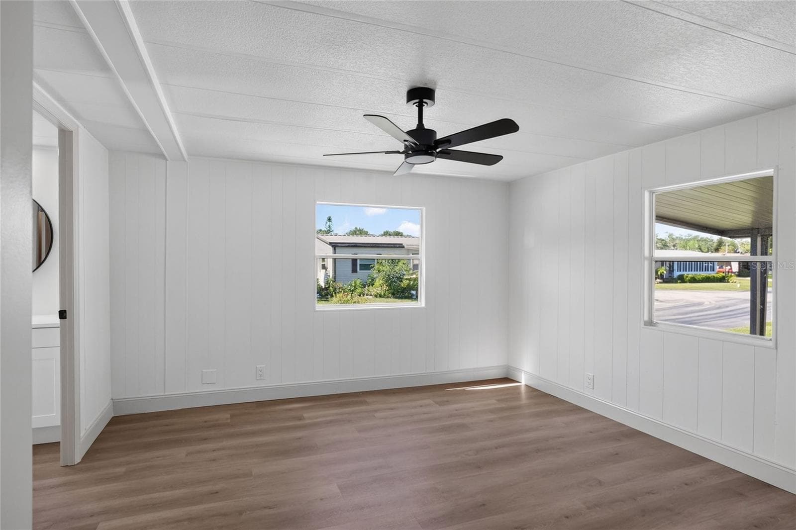 Primary Bedroom with en-suite bathroom and walk in closet - 2055 S FLORAL AVE #55, BARTOW