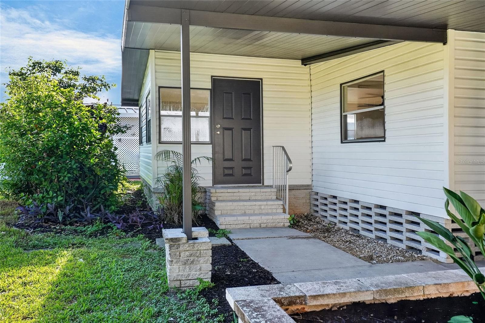 Covered patio off Florida Room - 2055 S FLORAL AVE #55, BARTOW