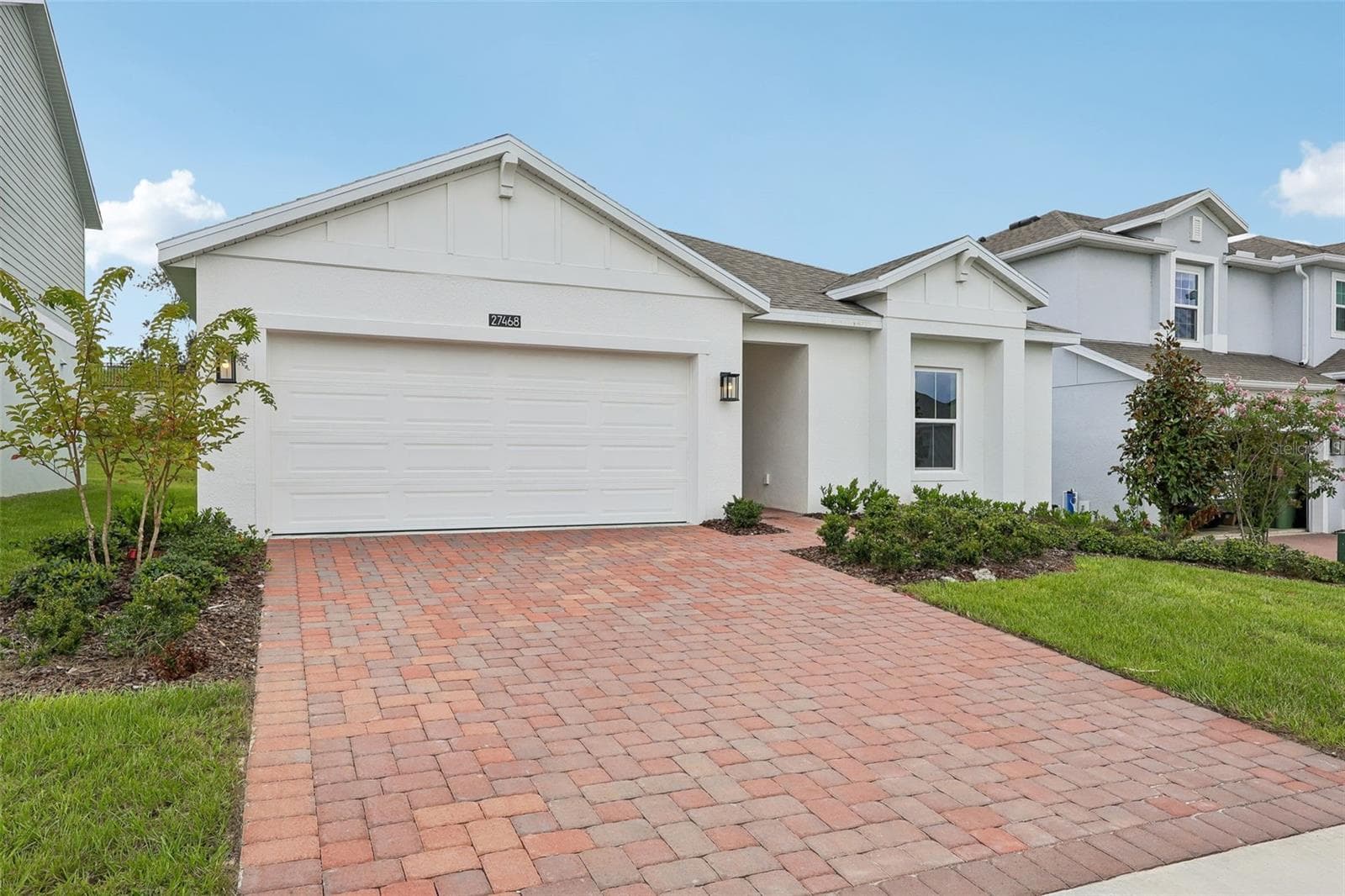 Front Exterior - 27468 BLACK KITE AVE, HOWEY IN THE HILLS