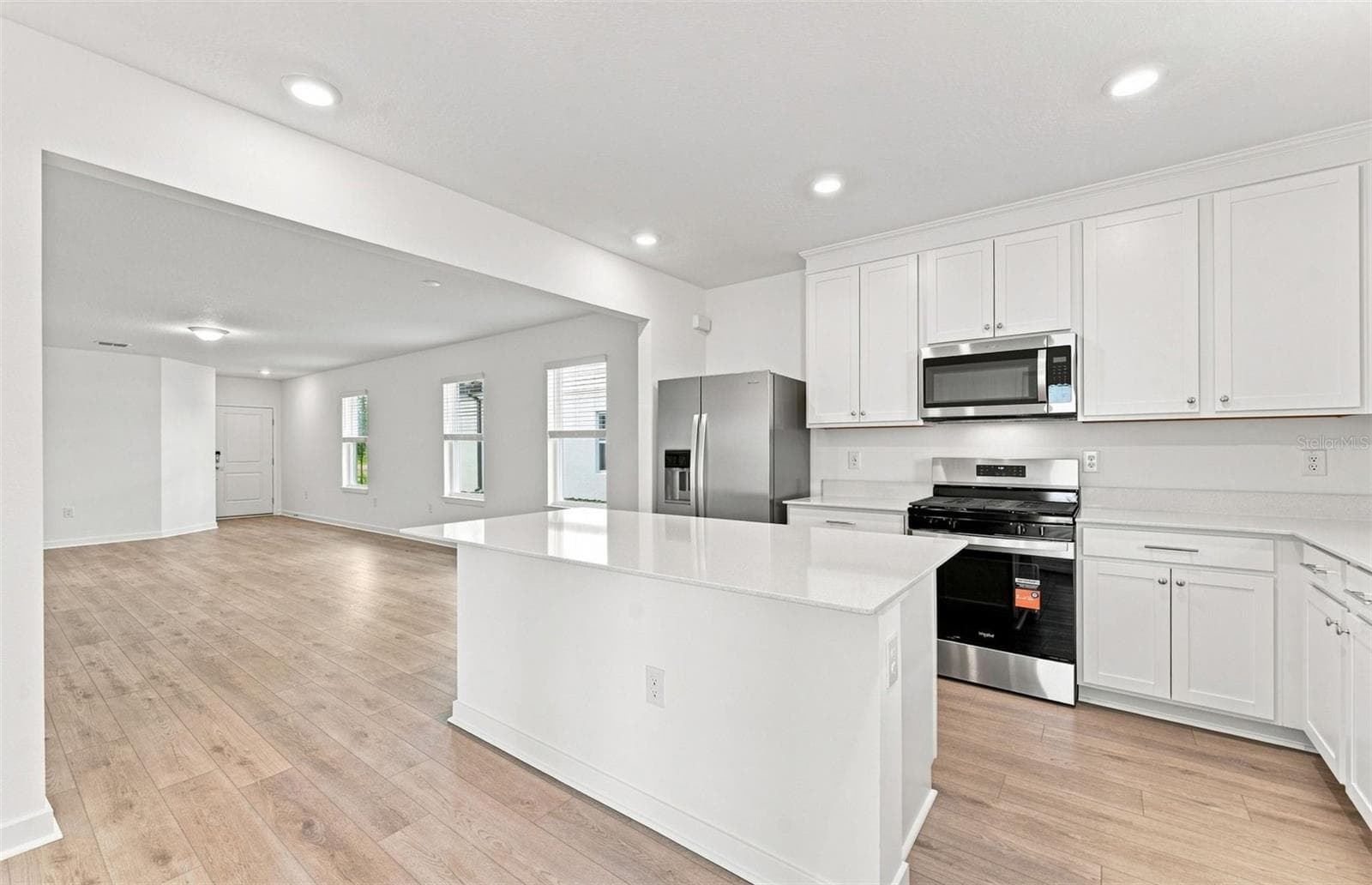 Open Kitchen to Cafe Area - 9181 NEWMONS PL, WILDWOOD